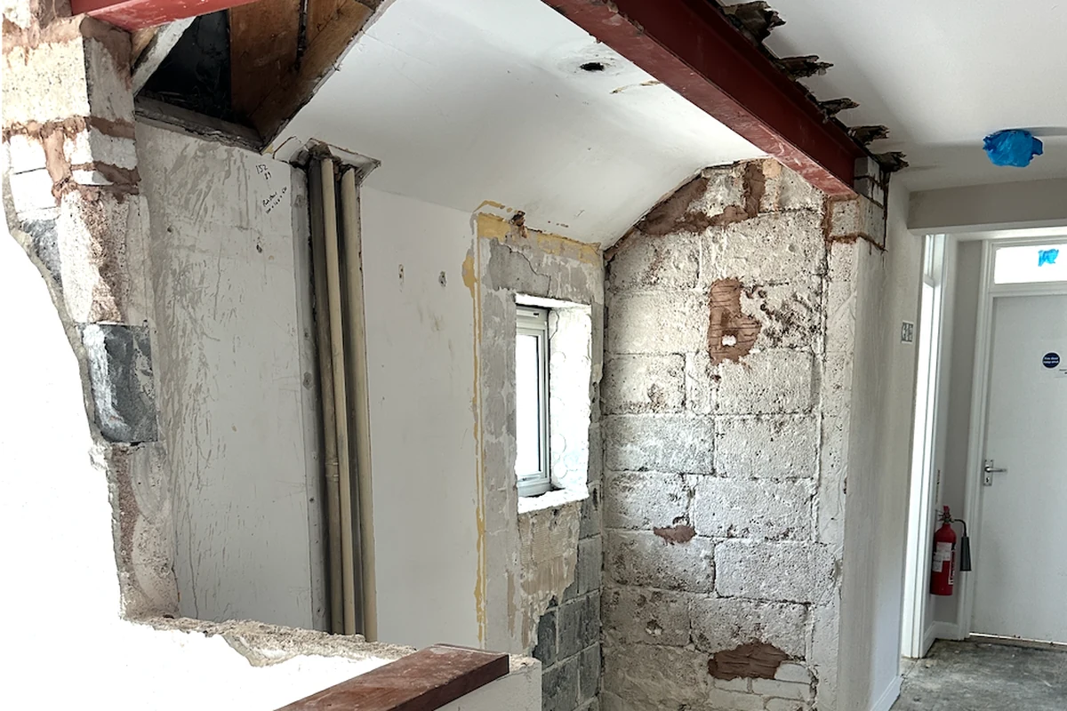 Structural retrofit works in progress inside an existing school building