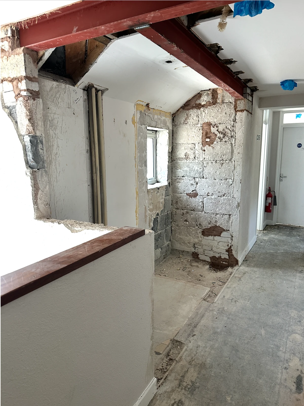 Structural retrofit works in progress inside an existing school building